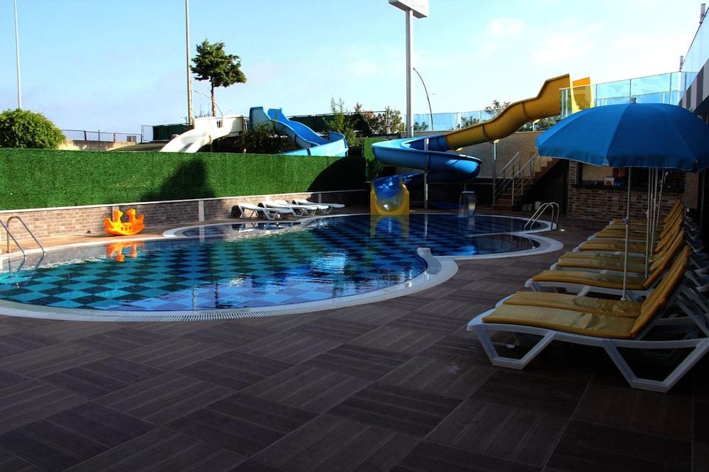 Merlin Beach Park Hotel Tosmur Exteriör bild